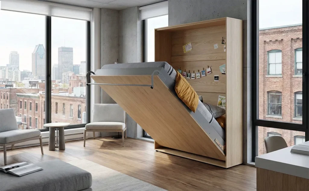 Modern Montreal wall bed in a mid-open position showcasing a premium steel frame and space-saving cabinet design.